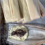 open tamale with spicy venison filling